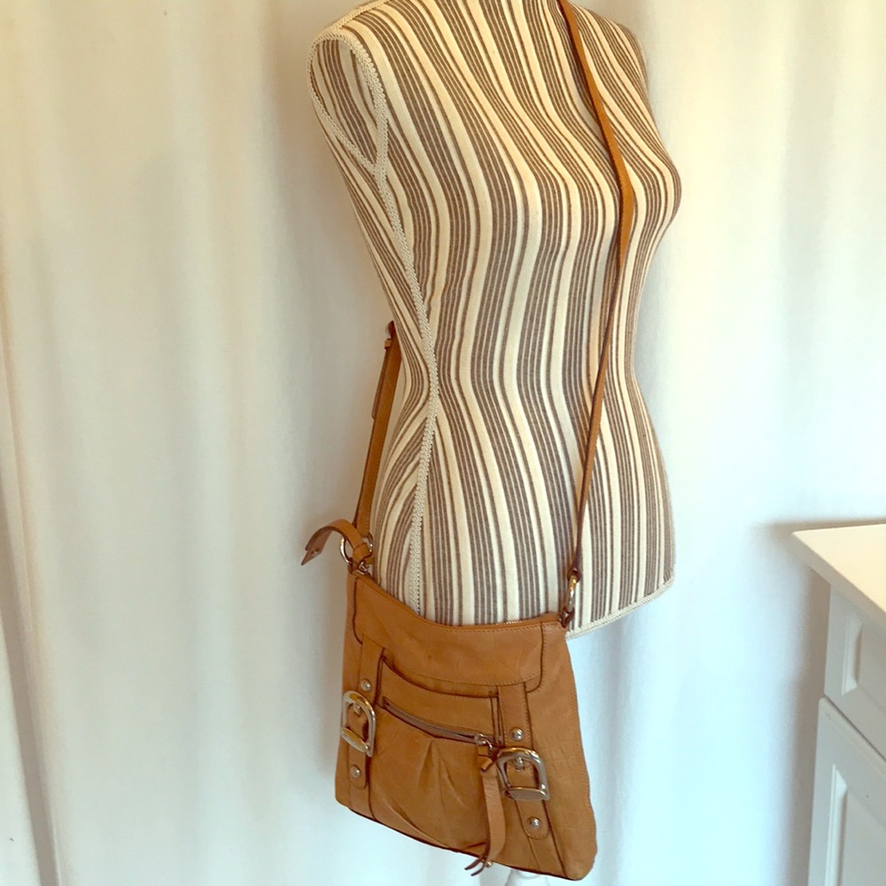 B. Makowsky Tan Crossbody Bag. Signs of normal